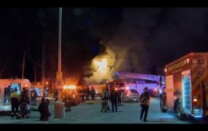 Firefighters lending each other a helping hand